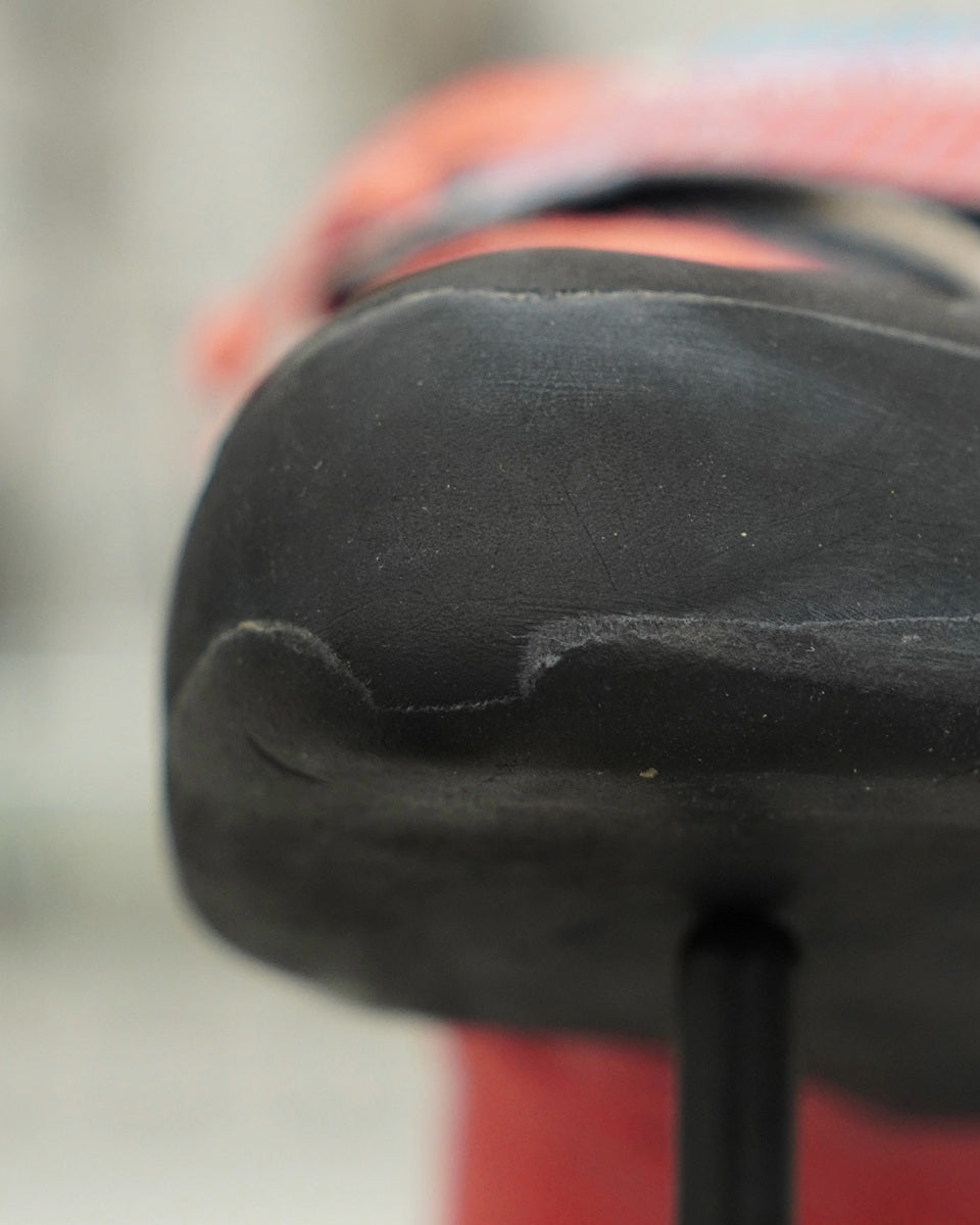 Close-up of a black shoe sole with a blurred background