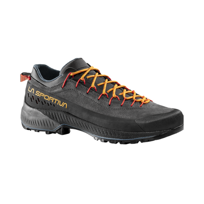 Gray hiking shoe with orange laces on a white background